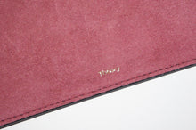 Theory Transformer Claret linden leather clutch