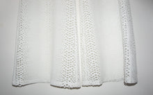 Twenty perforated off white wide leg pants