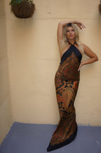 Floor length halter dress by Lavan