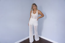 Twenty perforated off white wide leg pants